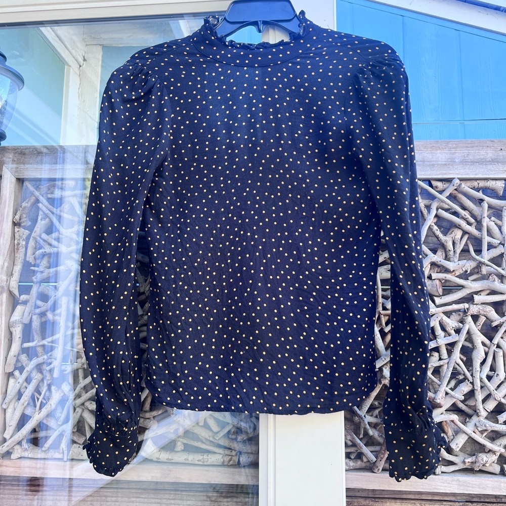 Reformation tie in the back polka dots. Super cute on!